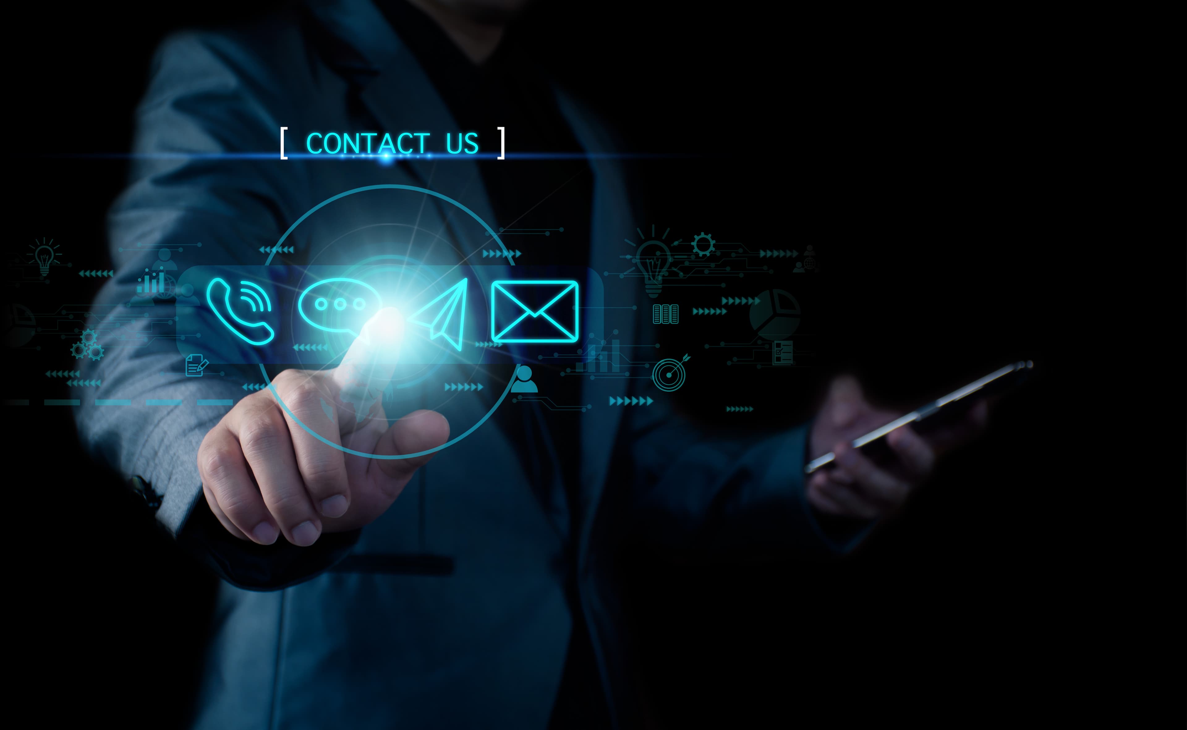 Business professional selecting a contact option on a digital interface